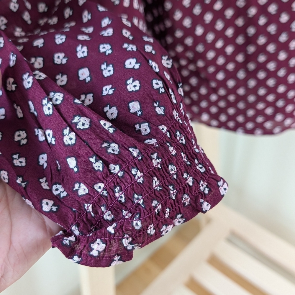 Floral Smocked Wrist Henley with 1/4 Button Down Closure In Plum - Picture 4 of 8